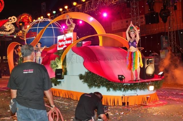 Float sponsored by 'Tee Yih Jia', distributor of Spring Home Food Products, driving through Orchard Road during Chingay 2005 procession. Chingay 2005 with the theme 'Parade of Dreams' was attended by Guest of Honour President S R Nathan and his wife.
