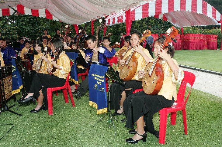 Youth Chinese Orchestra of People's Association (PA) Talents performing at Istana during Chinese New Year Garden Party hosted by Guest-of-Honour Prime Minister and Minister for Finance Lee Hsien Loong