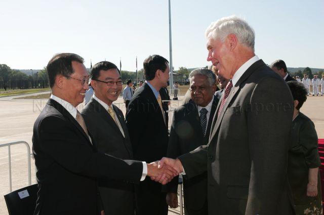 President S R Nathan introducing Singapore High Commissioner to Australia Joseph Koh Kok Hong (left) to Governor-General of the Commonwealth of Australia, Major-General (Ret) Michael Jeffery while Minister of State for Defence and National Development Cedric Foo (second from left) looks on at Royal Australian Air Force (RAAF) Fairbairn, Canberra. President and Mrs S R Nathan are on a six-day official state visit to Australia from March 13th to 18th.