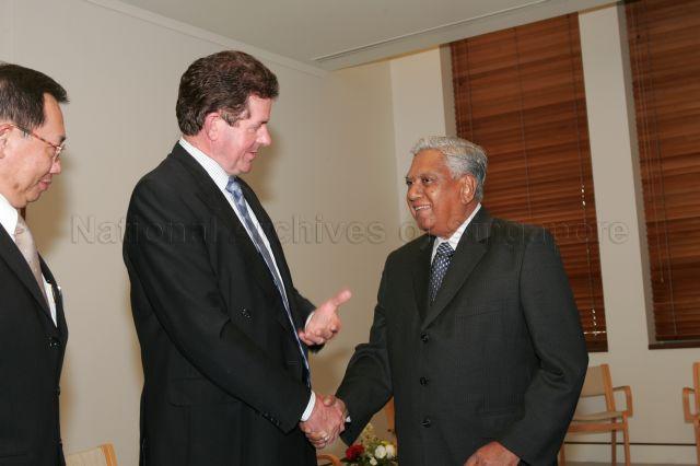 President S R Nathan exchanging greetings with Australian Member of Parliament Peter Slipper from Australia-Singapore Parliamentary Friendship Group (centre) while Singapore High Commissioner to Australia Joseph Koh Kok Hong (left) looks on at Parliament House, Canberra during President and Mrs S R Nathan's six-day official state visit to Australia from March 13th to 18th