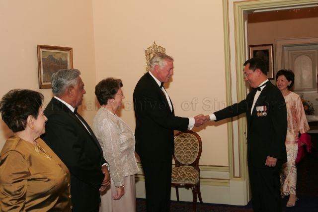 President and Mrs S R Nathan with hosts, Governor of Tasmania William Cox and wife Mrs Jocelyn Cox, receiving Singapore High Commissioner to Australia Joseph Koh Kok Hong and wife during state dinner at Government House, Hobart, Tasmania. President and Mrs Nathan are on a six-day official state visit to Australia from March 13th to 18th.
