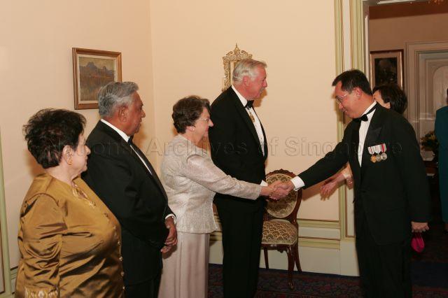 President and Mrs S R Nathan with hosts, Governor of Tasmania William Cox and wife Mrs Jocelyn Cox, receiving Singapore High Commissioner to Australia Joseph Koh Kok Hong and wife during state dinner at Government House, Hobart, Tasmania. President and Mrs Nathan are on a six-day official state visit to Australia from March 13th to 18th.