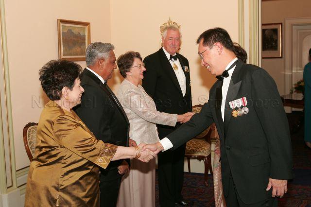 President and Mrs S R Nathan with hosts, Governor of Tasmania William Cox and wife Mrs Jocelyn Cox, receiving Singapore High Commissioner to Australia Joseph Koh Kok Hong and wife during state dinner at Government House, Hobart, Tasmania. President and Mrs Nathan are on a six-day official state visit to Australia from March 13th to 18th.