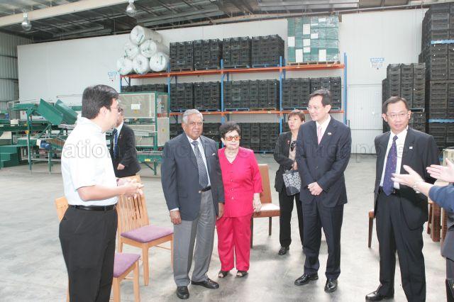President and Mrs S R Nathan at Qew Apricot Orchard, Coal River Valley, Richmond, Tasmania. With them are from right, Singapore High Commissioner to Australia Joseph Koh Kok Hong, Acting Second Minister for Finance and Senior Minister of State for Foreign Affairs Raymond Lim Siang Keat and owner of Qew Apricot Orchard Christopher Chong (left). President and Mrs S R Nathan are on a six-day official state visit to Australia from March 13th to 18th.