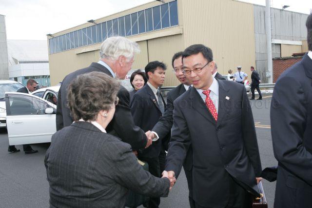 Minister of State for Defence and National Development Cedric Foo (front, right) and Singapore High Commissioner to Australia Joseph Koh Kok Hong (back, partially hidden) bidding goodbye to Mrs Jocelyn Cox and Governor of Tasmania William Cox respectively as they leave for Perth during President and Mrs S R Nathans six-day official state visit to Australia from March 13th to 18th