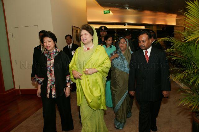 Bangladeshi Prime Minister Begum Khaleda Zia, who is at Changi Airport for her flight back to Bangladesh after a three-day official visit to Singapore, with Minister of State for Finance and Transport Mrs Lim Hwee Hua (left) and High Commissioner of Bangladesh to Singapore Munshi Faiz Ahmad (right)