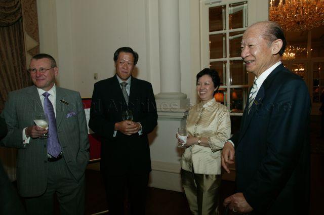 Co-Chairman of Economic Development Board (EDB)'s International Advisory Council (IAC) Madam Ho Ching (second from right) and Minister for Manpower and Second Minister for Education Dr Ng Eng Hen (second from left) with Quintiles Transnational Chairman Dr Dennis Gillings (left), who is to be appointed as EDB's IAC Emeritus Member, and EDB's IAC member Advisor to the Board of Toshiba Corporation Taizo Nishimuro at the cocktail reception during the closing dinner of the eighth EDB's IAC at the Istana