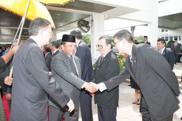 Yang Di-Pertuan Agong of Malaysia Tuanku Syed Sirajuddin (centre) being introduced to President S R Nathan's entourage when they arrive in Kuala Lumpur with President and Mrs S R Nathan who are on a five-day state visit to Malaysia from April 11- 15
