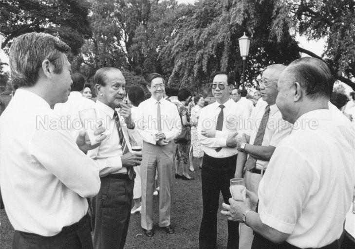 President Wee Kim Wee talking with guests during Istana garden party held for members or management committee of Medical Academy of Singapore, College of General Practitioner, Keppel Club, Singapore Island Country Club, Tanah Merah Country Club, Tanah Merah Country Club, Sentosa Golf Club and Ministry of Health officials and Government Parliamentary Committee for Health