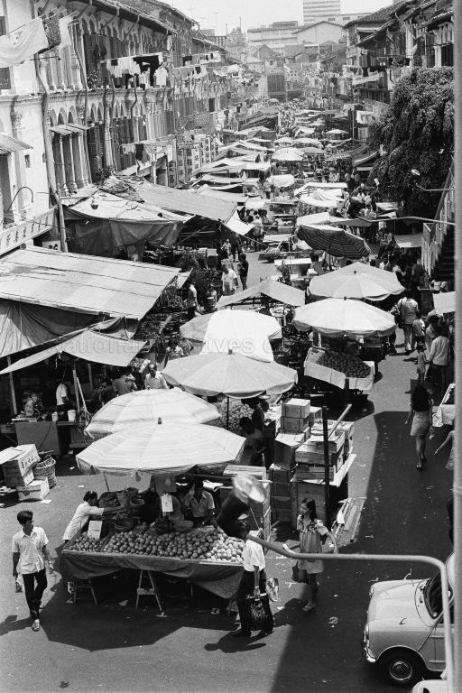 This is the New Bridge Road entrance into Pagoda Street. The photograph was taken from the overhead bridge across New Bridge Road. A bit of the overhead bridge staircase handrailing can be seen on the right of the photograph.