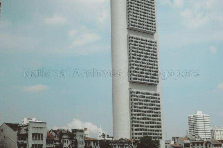 Oversea-Chinese Banking Corporation (OCBC) Centre and shophouses along the Singapore River. Designed by architect I M Pei and completed in 1976, OCBC Centre was one of the tallest buildings in Singapore in the late 1970s.