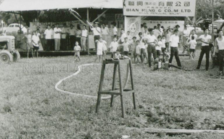 Exhibit showing a water spray system at agricultural show in Potong Pasir