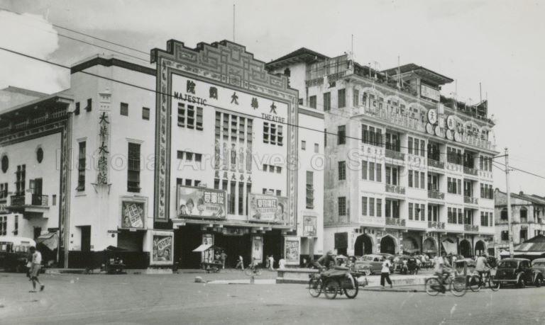 Majestic Theatre on the left and Yue Hwa Building, originally known as Nam Tin Building and the site of the Great Southern Hotel on the right at the junction of Eu Tong Sen Street and Upper Cross Street (C1950S)