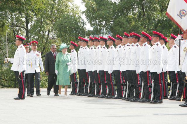 Queen Elizabeth II, accompanied by President S R Nathan, inspecting the guard of honour during ceremonial welcome at Istana