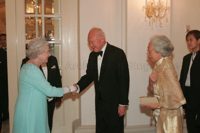 Queen Elizabeth II being greeted by Minister Mentor Lee Kuan Yew upon arrival at Istana for the dinner hosted by President and Mrs S R Nathan