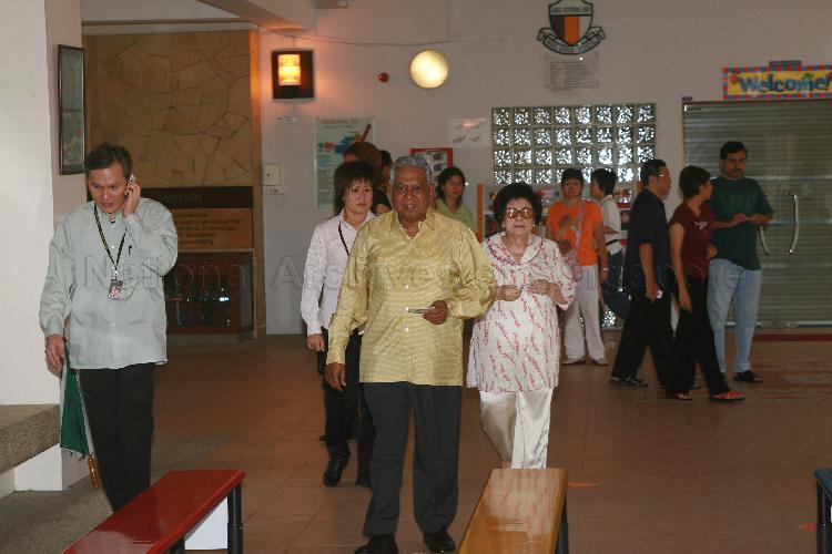 President and Mrs S R Nathan at polling station situated in Haig Girls' School to cast their votes during Singapore General Election