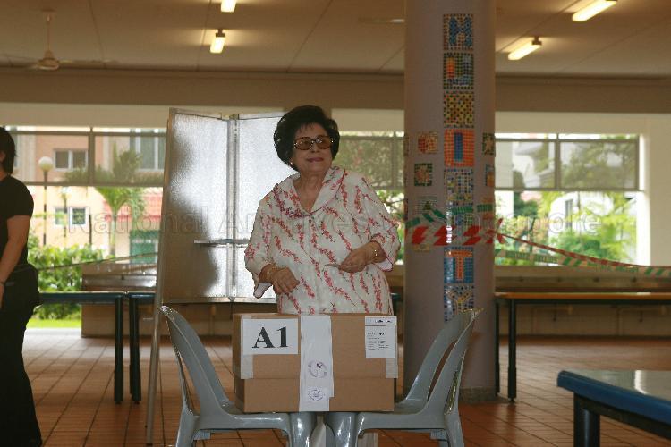 Mrs S R Nathan casting her vote at polling station situated in Haig Girls' School during Singapore General Election