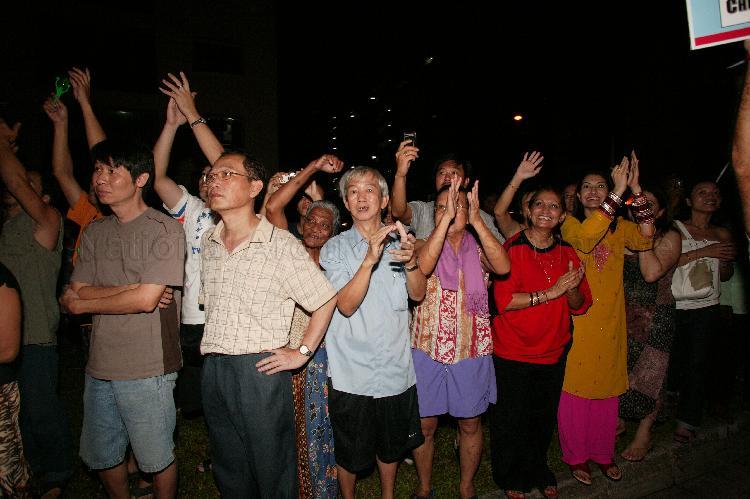 Singapore Democratic Alliance (SDA) supporters and onlookers in the street at Potong Pasir during Singapore General Election