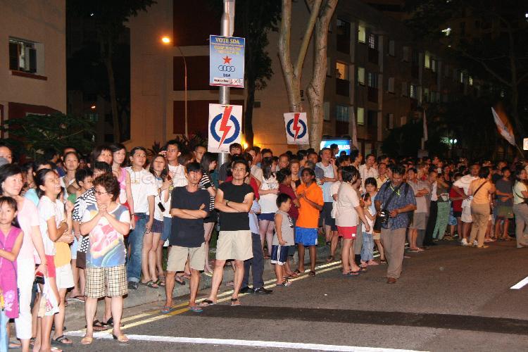 Singapore Democratic Alliance (SDA) supporters and onlookers in the street at Potong Pasir during Singapore General Election