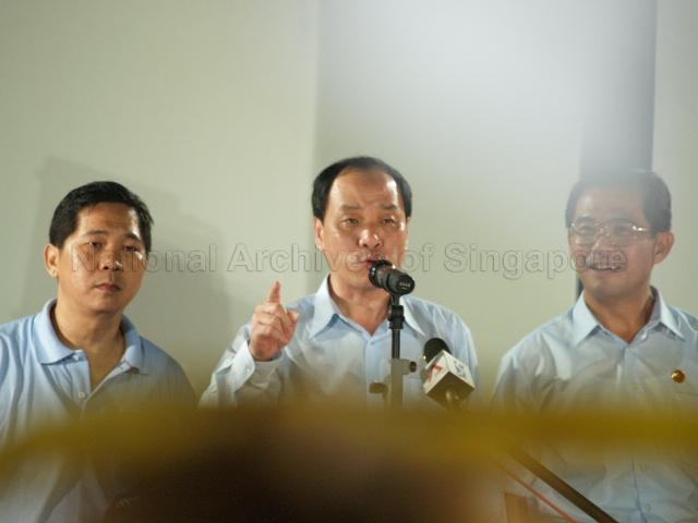 Workers' Party (WP) candidate for Hougang Low Thia Khiang (centre) making an address at Yio Chu Kang stadium, the assembly centre for WP and their supporters during Singapore General Election