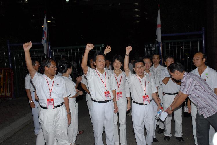 Arrival of People's Action Party (PAP) candidates for Tampines Group Representation Constituency (GRC) Masagos Zulkifli bin Masagos Mohamad (left), Ong Kian Min, Ms Irene Ng Phek Hoong, Mah Bow Tan and Sin Boon Ann (partially hidden) at Serangoon stadium, the assembly centre for PAP and their supporters during Singapore General Election