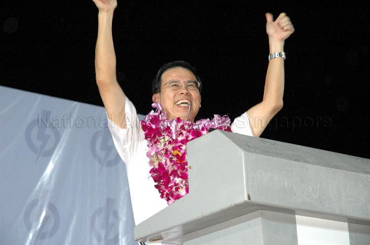 People's Action Party (PAP) candidate for Bukit Panjang Dr Teo Ho Pin giving the thumbs up to PAP on stage at Woodlands stadium after his victory during Singapore General Election. The stadium was assembly centre for PAP and their supporters.