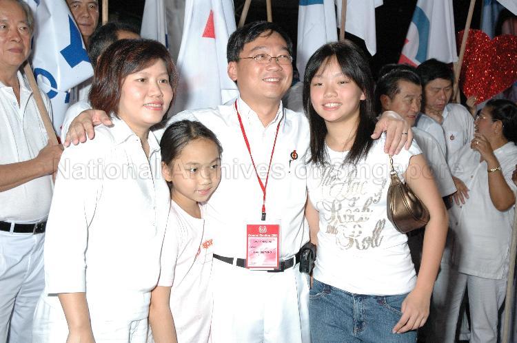 People's Action Party (PAP) candidate for Chua Chu Kang Gan Kim Yong, his wife and daughters posing for a family photograph at Woodlands stadium, the assembly centre for PAP and their supporters during Singapore General Election