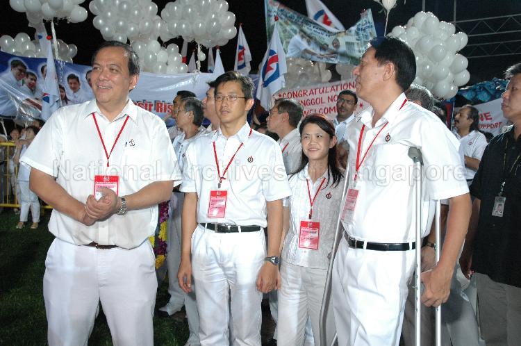 People's Action Party (PAP) candidates for Pasir Ris-Punggol Group Representation Constituency (GRC), from right, Teo Chee Hean, Ms Penny Low, Teo Ser Luck and Charles Chong You Fook at Woodlands stadium, the assembly centre for PAP and their supporters during Singapore General Election