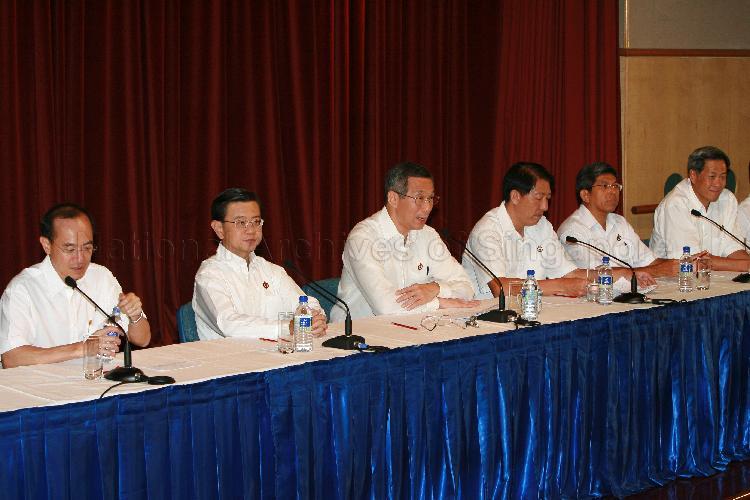 Elected People's Action Party (PAP) Member of Parliament (MP) for Ang Mo Kio Group Representation Constituency (GRC) Lee Hsien Loong (third from left) with key elected PAP MPs (from left) George Yeo Yong-Boon of Aljunied GRC, Wong Kan Seng of Bishan-Toa Payoh GRC, Teo Chee Hean of Pasir Ris-Punggol GRC, Dr Yaacob Ibrahim of Jalan Besar GRC and Dr Ng Eng Hen of Bishan-Toa Payoh GRC holding post-election press conference at Treasury Building