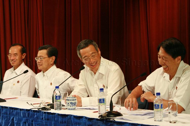 Elected People's Action Party (PAP) Members of Parliament (from right) Teo Chee Hean of Pasir Ris-Punggol Group Representation Constituency (GRC), Lee Hsien Loong of Ang Mo Kio GRC, Wong Kan Seng of Bishan-Toa Payoh GRC and George Yeo Yong-Boon of Aljunied GRC holding post-election press conference at Treasury Building