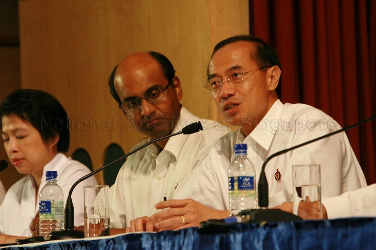 Elected People's Action Party (PAP) Member of Parliament (MP) for Aljunied Group Representation Constituency (GRC) George Yeo Yong-Boon (right) speaking at post-election press conference with MP-elect for Jurong GRC Tharman Shanmugaratnam and MP-elect for Aljunied GRC Mrs Lim Hwee Hua looking on. The press conference was held at Treasury Building.