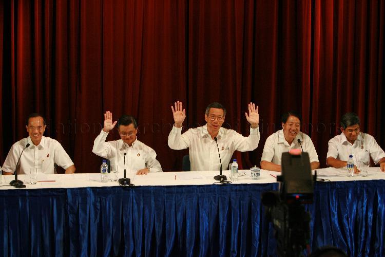 Elected People's Action Party (PAP) Member of Parliament (MP) for Ang Mo Kio Group Representation Constituency (GRC) Lee Hsien Loong (centre) with key elected PAP MPs (from left to right) George Yeo Yong-Boon of Aljunied GRC, Wong Kan Seng of Bishan-Toa Payoh GRC, Teo Chee Hean of Pasir Ris-Punggol GRC and Dr Yaacob Ibrahim of Jalan Besar GRC holding post-election press conference at Treasury Building
