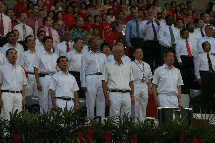 National Day Parade 2006 at National Stadium -- View of Prime Minister Lee Hsien Loong, Senior Minister Goh Chok Tong, Deputy Prime Minister and Minister for Home Affairs Wong Kan Seng, Cabinet ministers and Members of Parliament singing national anthem