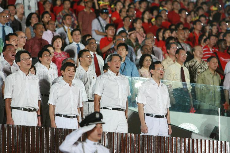 National Day Parade 2007 at Marina Bay -- Ministers and Members of Parliament singing the National anthem 'Majulah Singapura'
