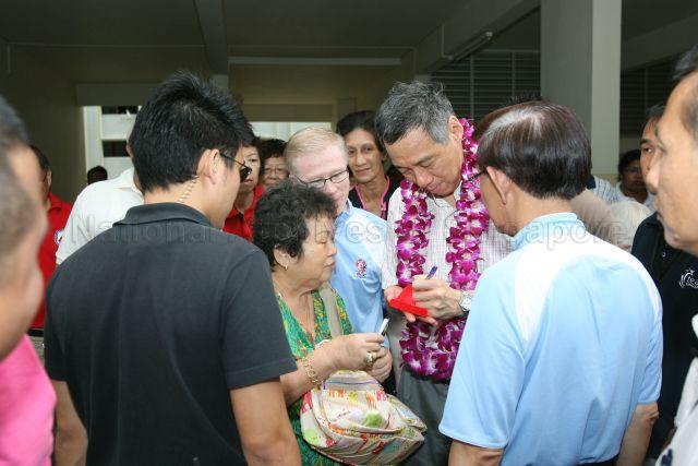 Taken at: Clementi Community Engagement Day at Blk 322 Clementi Ave 5 Pictured: Guest-of-Honour Prime Minister Lee Hsien Loong and Member of Parliament for West Coast GRC Arthur Fong