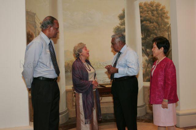 President S R Nathan chatting with the three recipients of the inaugural Library of Association of Singapore Professional Service Award, from left, Mr R Ramachandran, Ms Manijeh Namazie and Ms Lau Siew Kheng during reception for librarians and information professionals at Istana