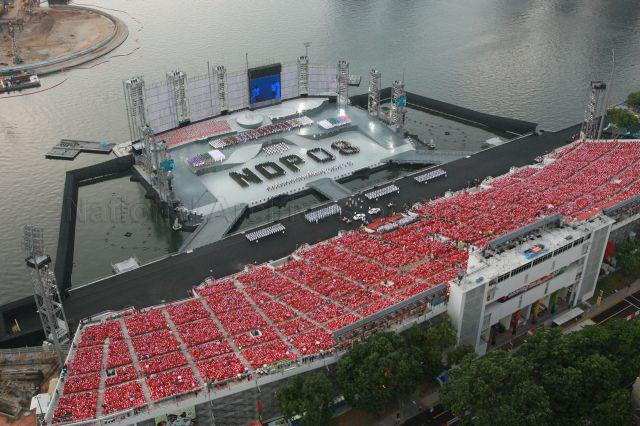 National Day Parade 2008 at Marina Bay - Aerial view of spectator stands and floating platform with the phrase 'NDP 08' formed by contingents
