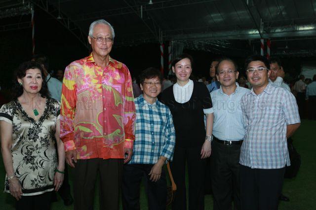 Senior Minister Goh Chok Tong and Mrs Goh posing for photograph with guests at National Day reception hosted by President and Mrs S R Nathan at the Istana