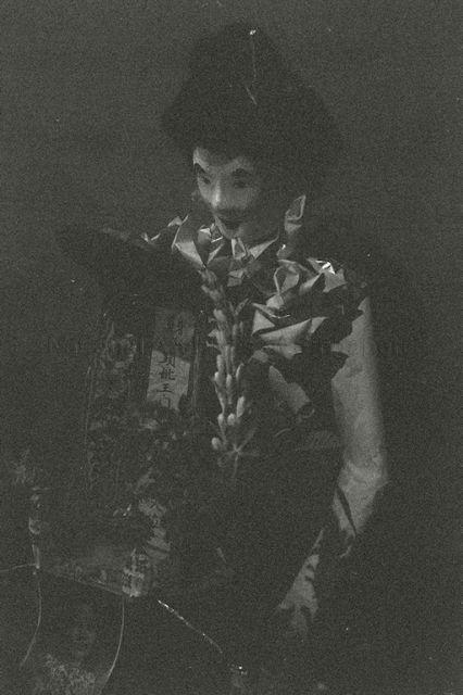 Exhumation of Chinese graves at Kampong San Teng cemetery in the 1980s: Paper figurines used in special funerary rituals conducted by Taoist priests prior to exhumation