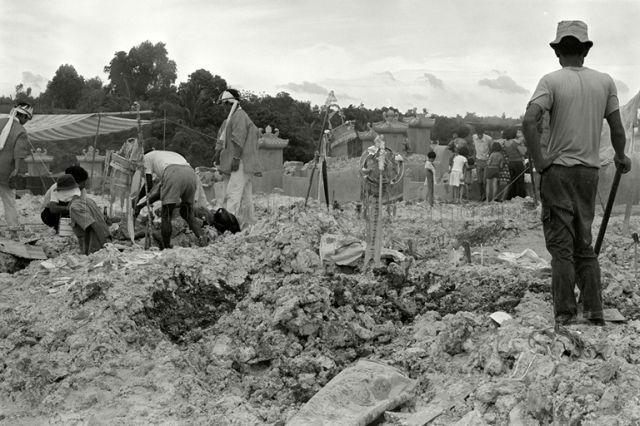 Preparing the grave at Choa Chu Kang cemetery