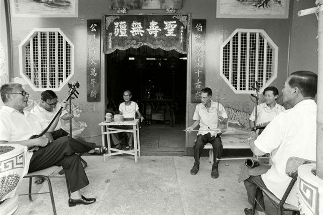 Traditional Chinese music group practising at Tua Peh Kong temple at Omar Road