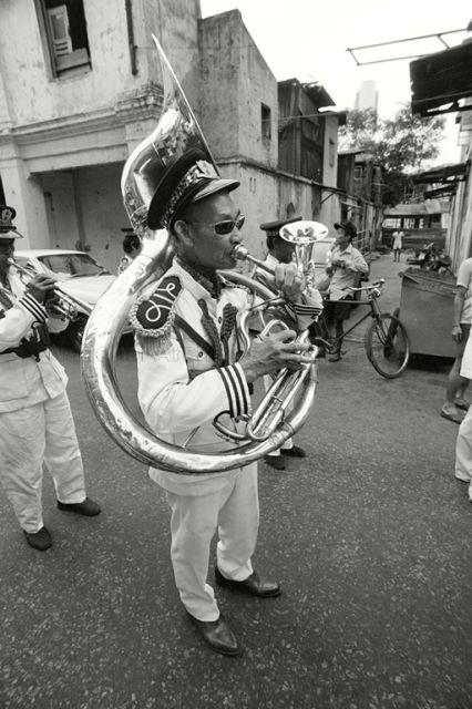 Chinese funeral band members at a funeral