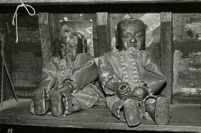 Back stage altar of Teochew opera &nbsp;troupe Lau Chet Kee Hiang showing statues depicting patron deities "Hai Dee" three brother princes