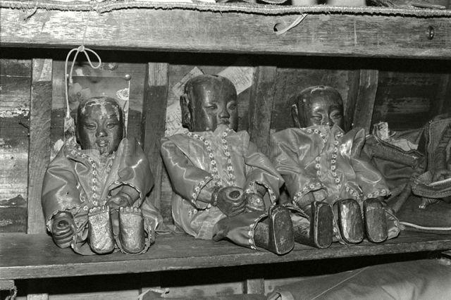 Back stage altar of Teochew opera &nbsp;troupe Lau Chet Kee Hiang showing statues depicting patron deities "Hai Dee" three brother princes