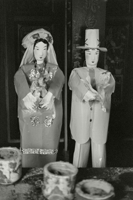 Ghost wedding (wedding of people who are already dead) - Paper effigies of ghost bride and groom