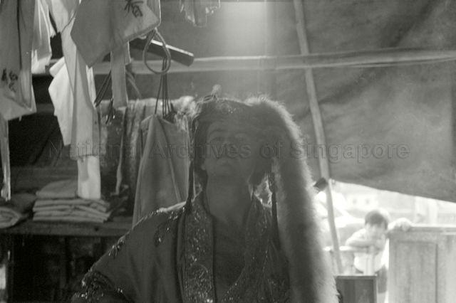 Portrait of photographer Ronni Pinsler in Chinese opera costume