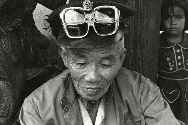 Charismatic, Chinese beggar outside Malacca temple