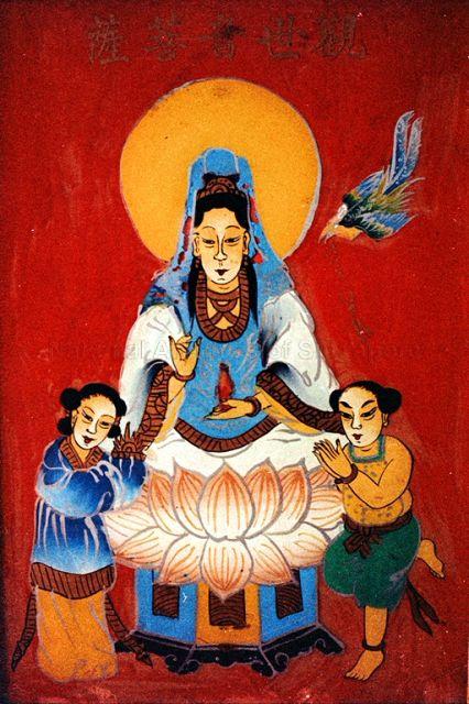 Framed picture of Guan Yin, Goddess of Mercy with acolytes Shan Cai (right) and Long Nu (left)