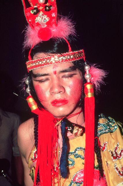 Chinese medium dressed up as a monk