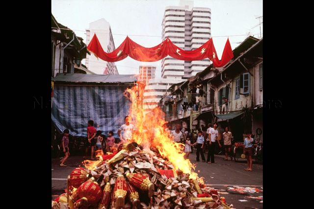 Lim Ba Burning offerings to the deities as part of Taoist ritual at